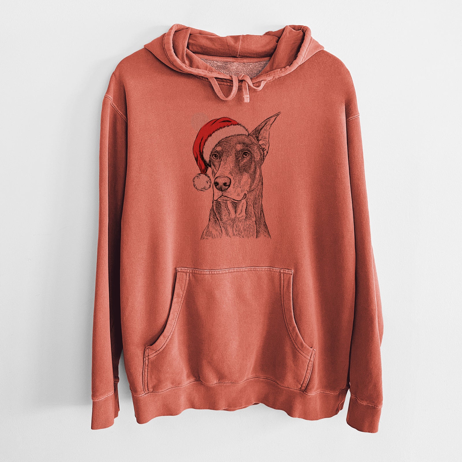 Hand-drawn sketch of RJ the Doberman Pinscher wearing a Santa hat on an Amber Unisex pigment dyed hoodie