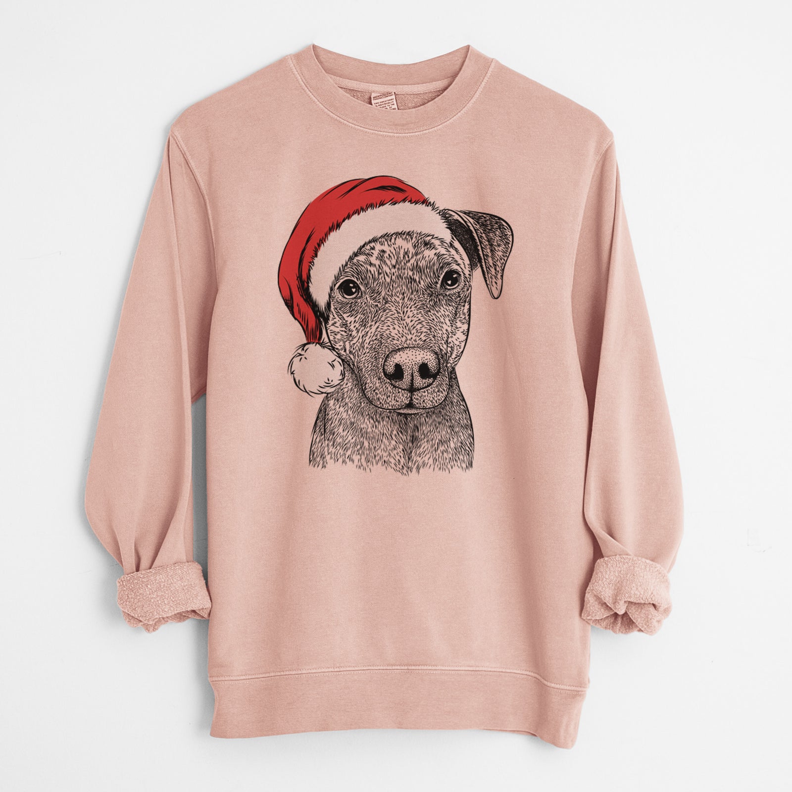 Hand-drawn sketch of Reeses the Pitbull wearing a Santa hat on a Dusty Pink Unisex pigment dyed crew sweatshirt