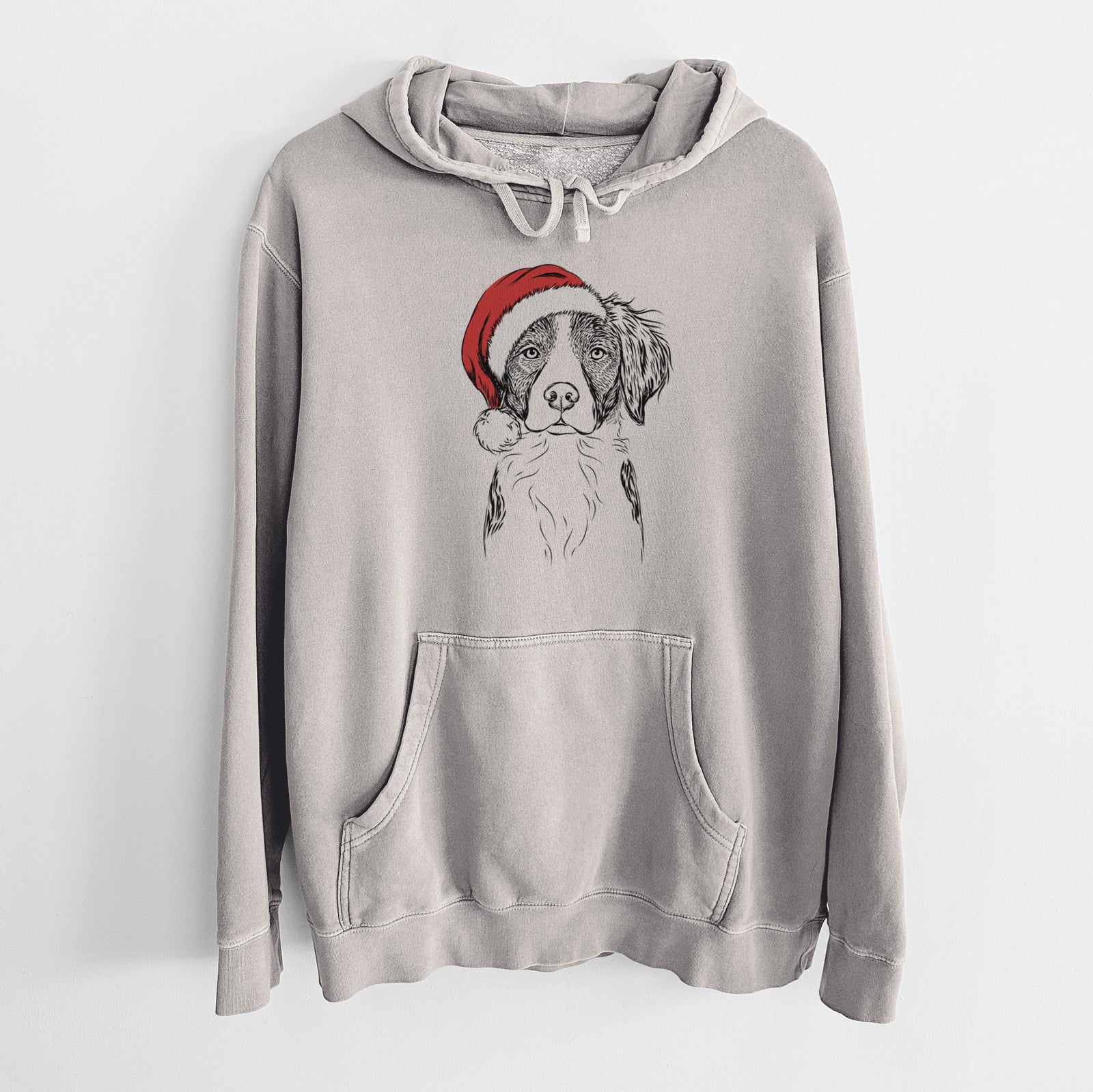 Hand-drawn sketch of Remi the Brittany wearing a Santa hat on a Cement Unisex pigment dyed hoodie