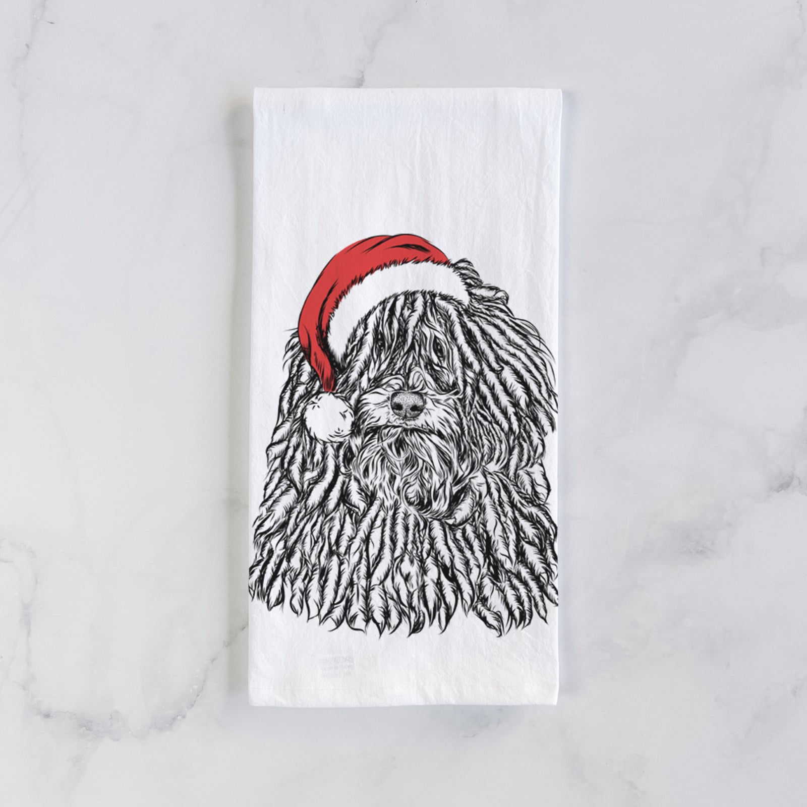 Hand-drawn sketch of Rezi the Puli wearing a Santa hat on a tea towel