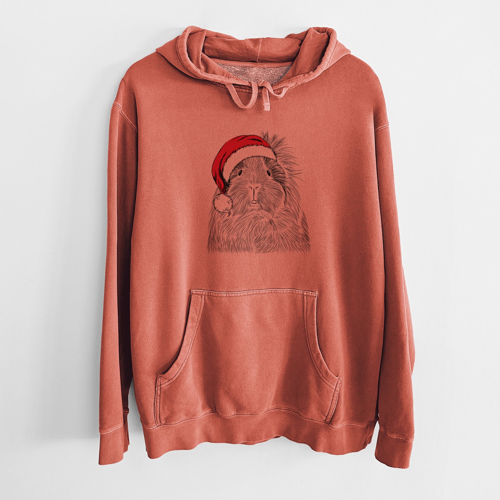 Hand-drawn sketch of Rhino the Guinea Pig wearing a Santa hat on an Amber Unisex pigment dyed hoodie