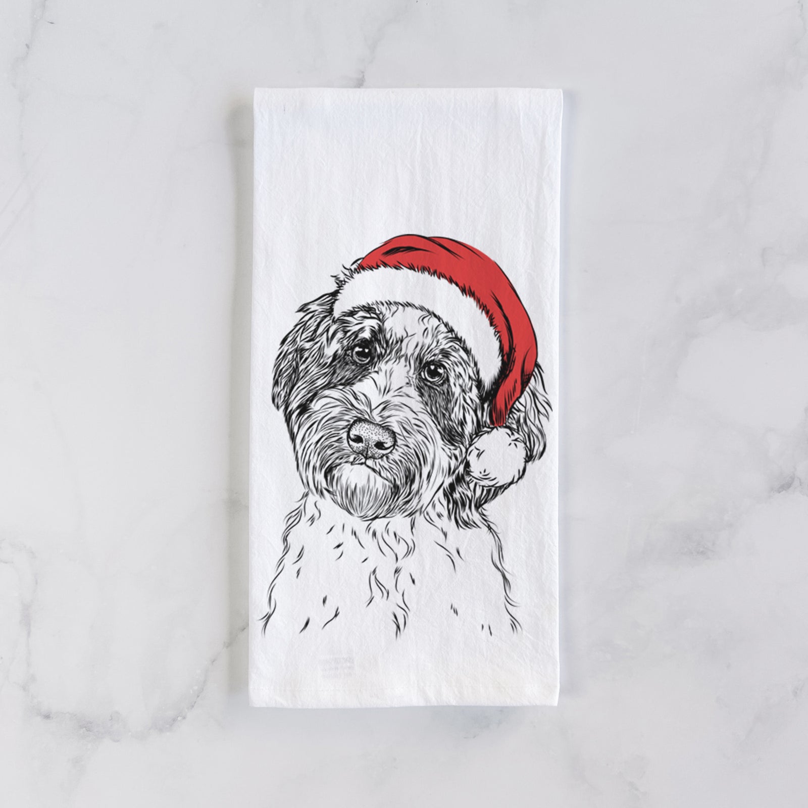 Hand-drawn sketch of Rooney the Aussiedoodle wearing a Santa hat on a tea towel
