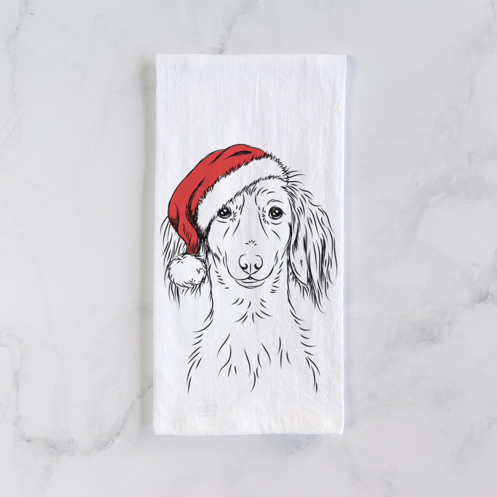 Hand-drawn sketch of Roux the Long Haired Dachshund wearing a Santa hat on a tea towel