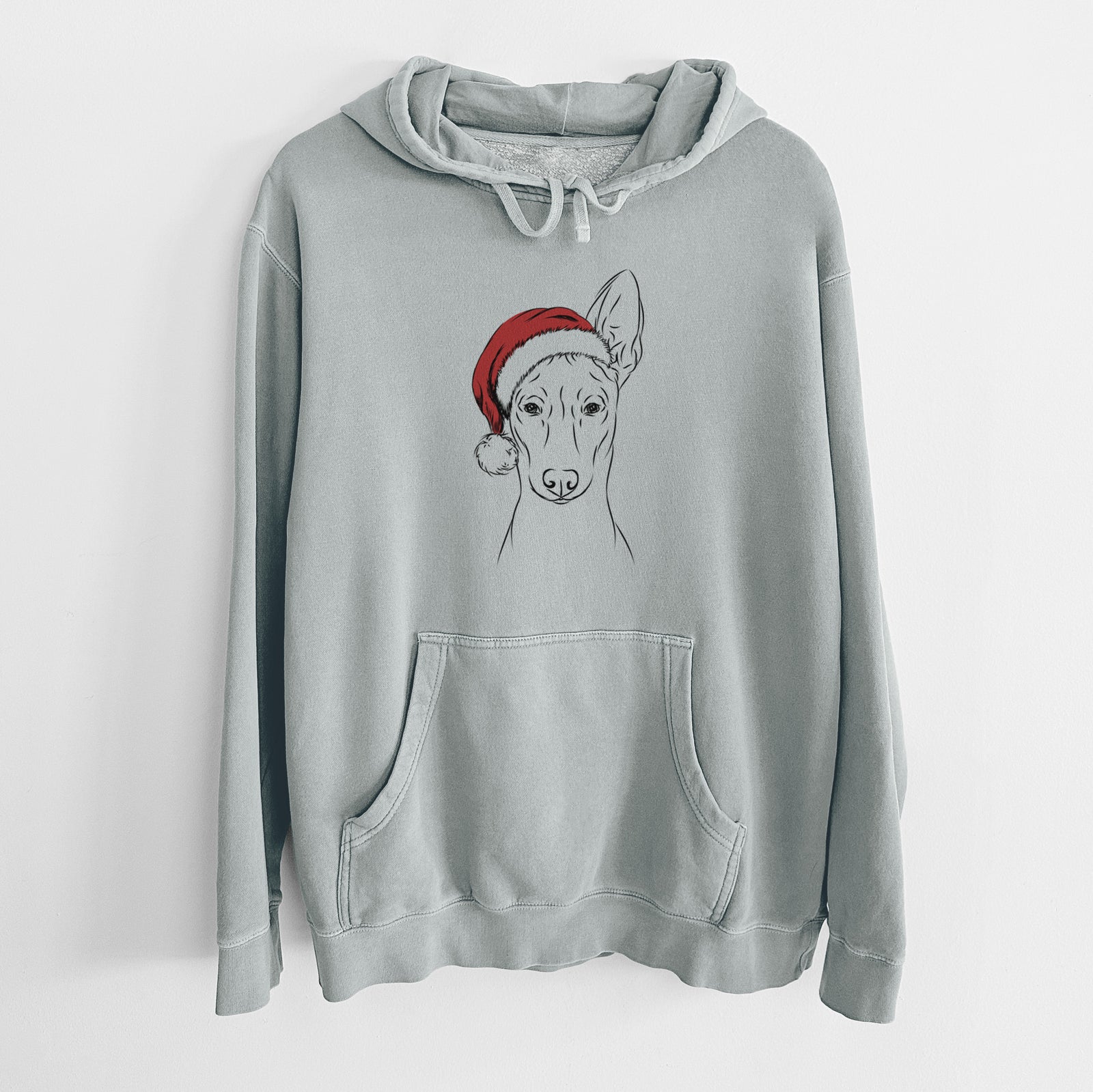 Hand-drawn sketch of Ruadh the Pharaoh Hound wearing a Santa hat on a Sage Unisex pigment dyed hoodie