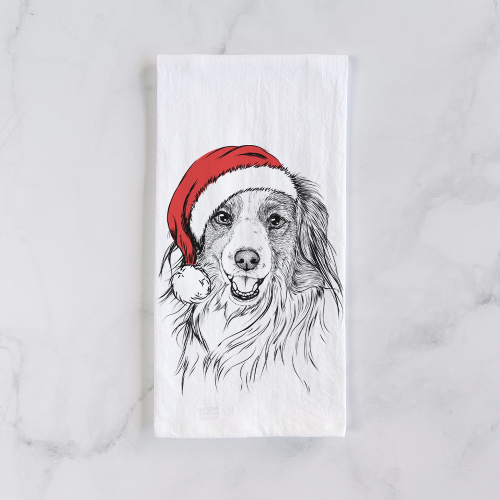 Hand-drawn sketch of Rutger the Nederlandse Kooikerhondje wearing a Santa hat on a tea towel