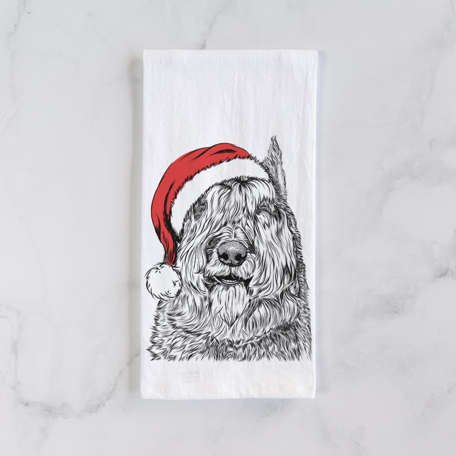 Hand-drawn sketch of Sabre the Bouvier Des Flandres wearing a Santa hat on a tea towel