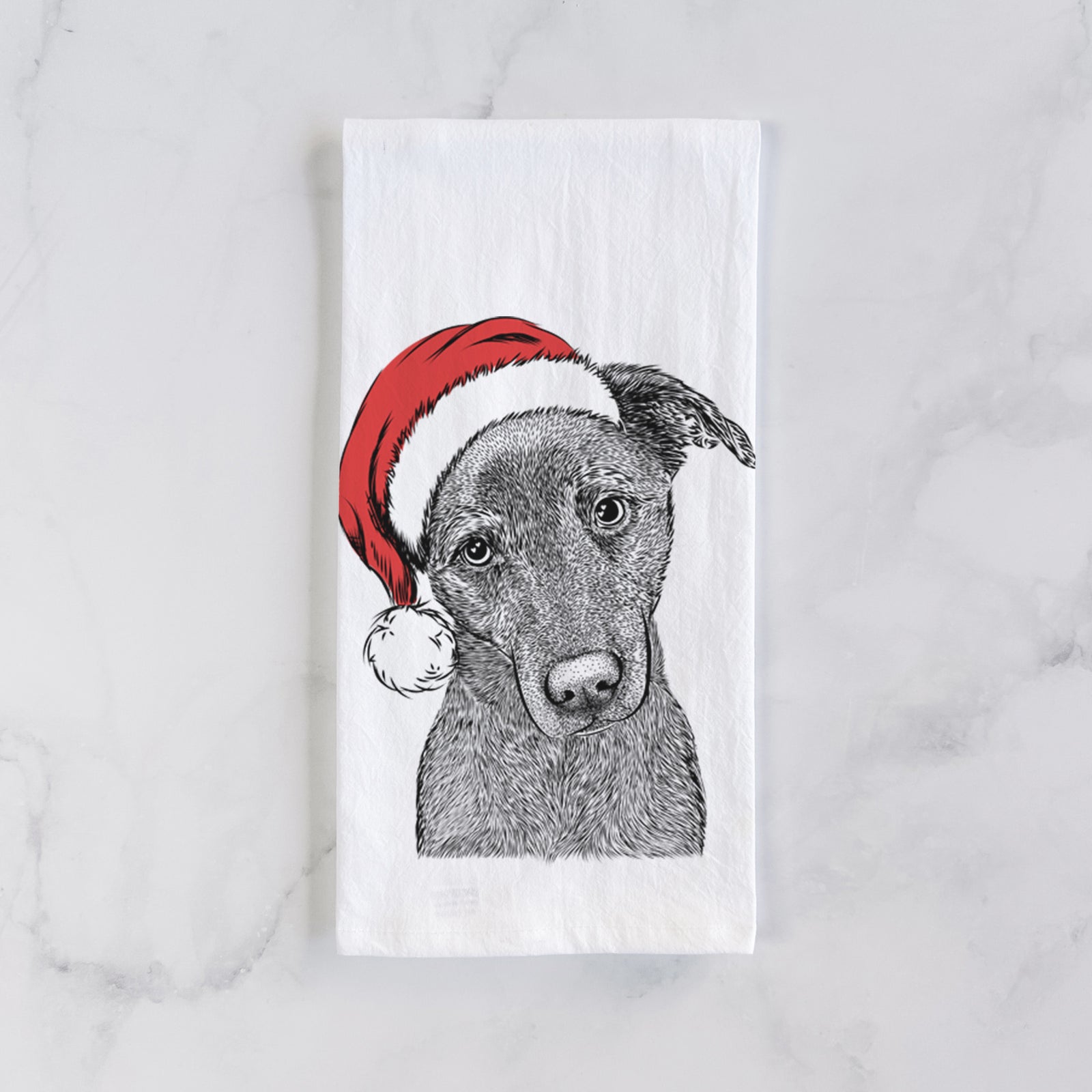 Hand-drawn sketch of Sadie the Whipador wearing a Santa hat on a tea towel