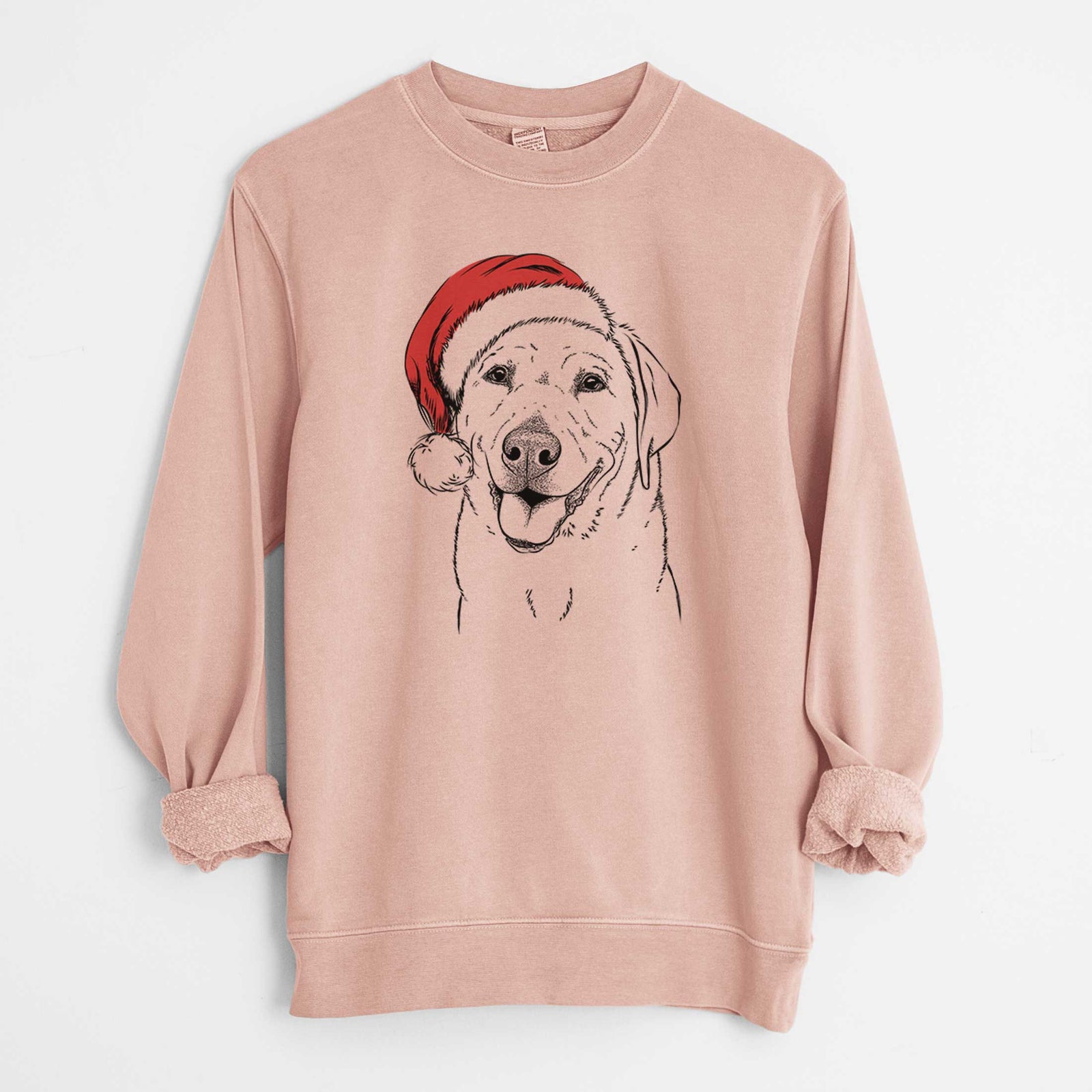 Hand-drawn sketch of Sanford the Labrador Retriever wearing a Santa hat on a Dusty Pink Unisex pigment dyed crew sweatshirt