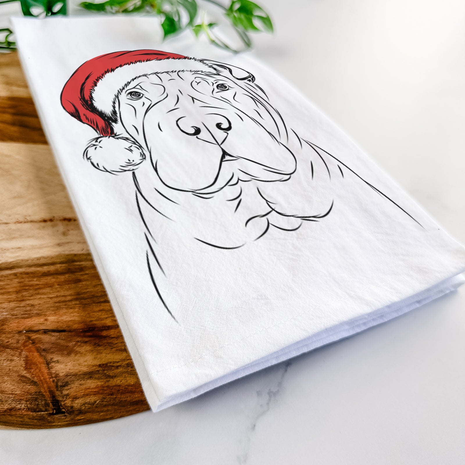Hand-drawn sketch of Sharpy the Shar Pei wearing a Santa hat on a tea towel