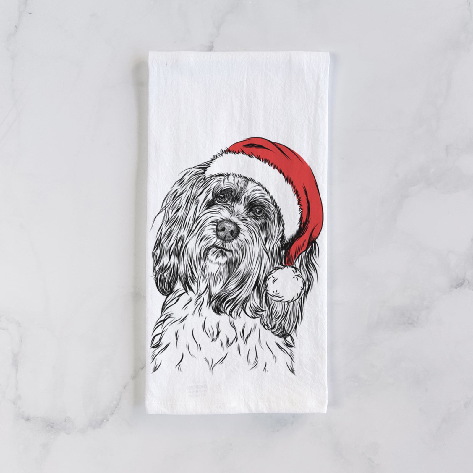 Hand-drawn sketch of Shenpa the Tibetan Terrier wearing a Santa hat on a tea towel