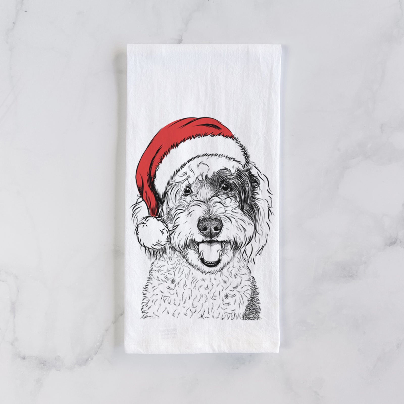 Hand-drawn sketch of Sherlock the Sheepadoodle wearing a Santa hat on a tea towel