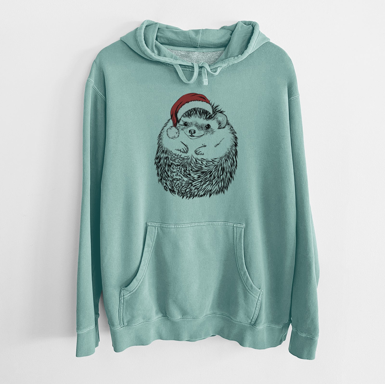 Hand-drawn sketch of Sid the Hedgehog wearing a Santa hat on a Mint Unisex pigment dyed hoodie