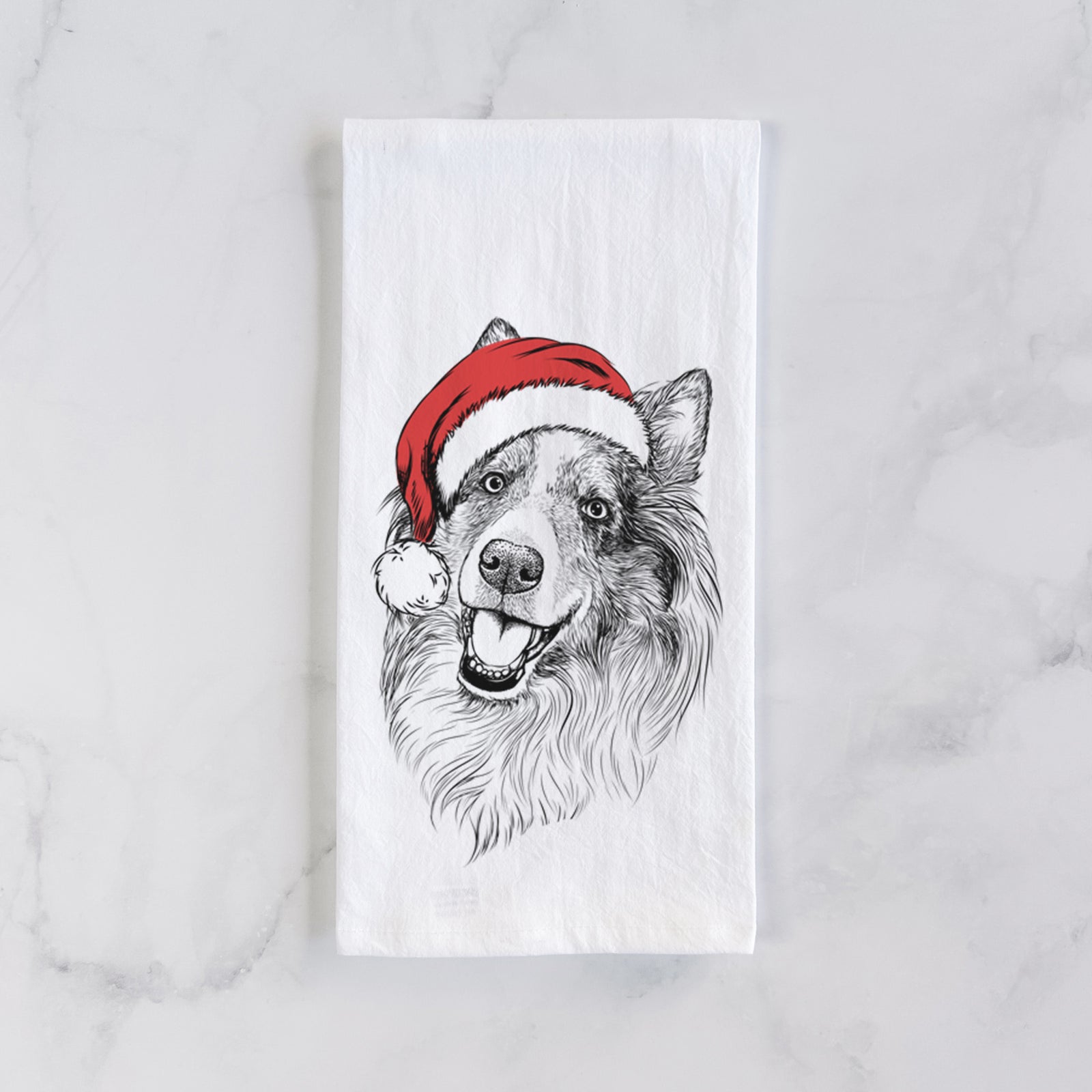 Hand-drawn sketch of Skylar the Shetland Sheepdog wearing a Santa hat on a tea towel