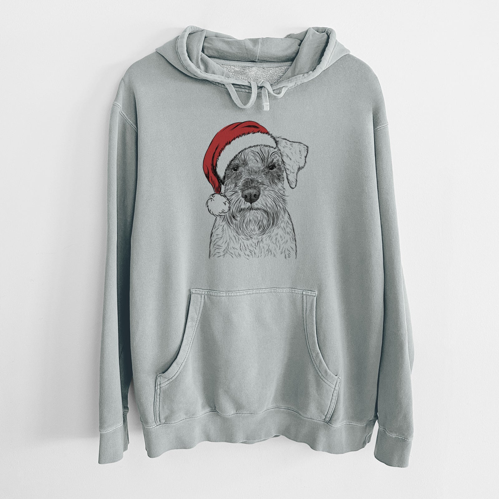 Hand-drawn sketch of Smokey the Miniature Schnauzer wearing a Santa hat on a Sage Unisex pigment dyed hoodie