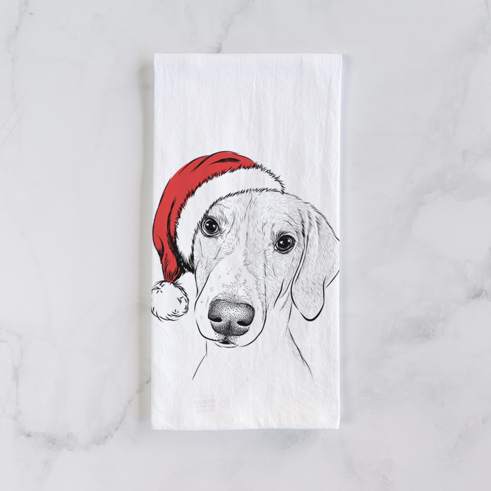 Hand-drawn sketch of Stanley the Foxhound wearing a Santa hat on a tea towel