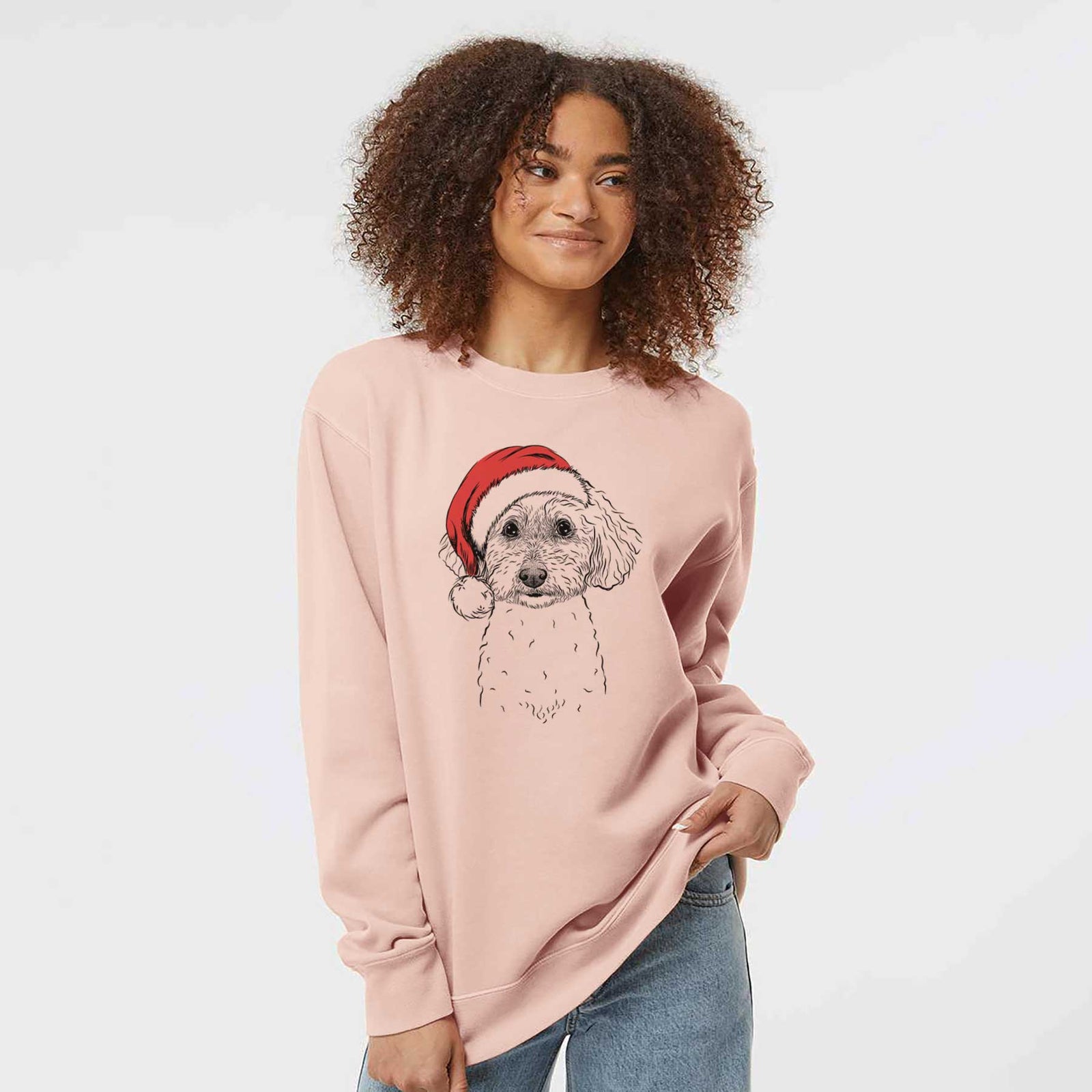 Hand-drawn sketch of Stitch the Bichonpoo wearing a Santa hat on a Dusty Pink Unisex pigment dyed crew sweatshirt