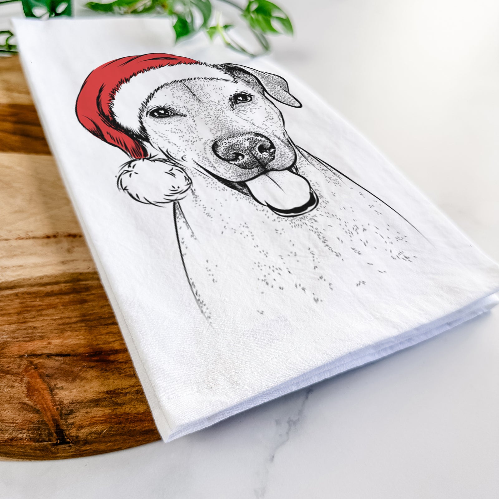 Hand-drawn sketch of Sugar the American Staffordshire Mix wearing a Santa hat on a tea towel