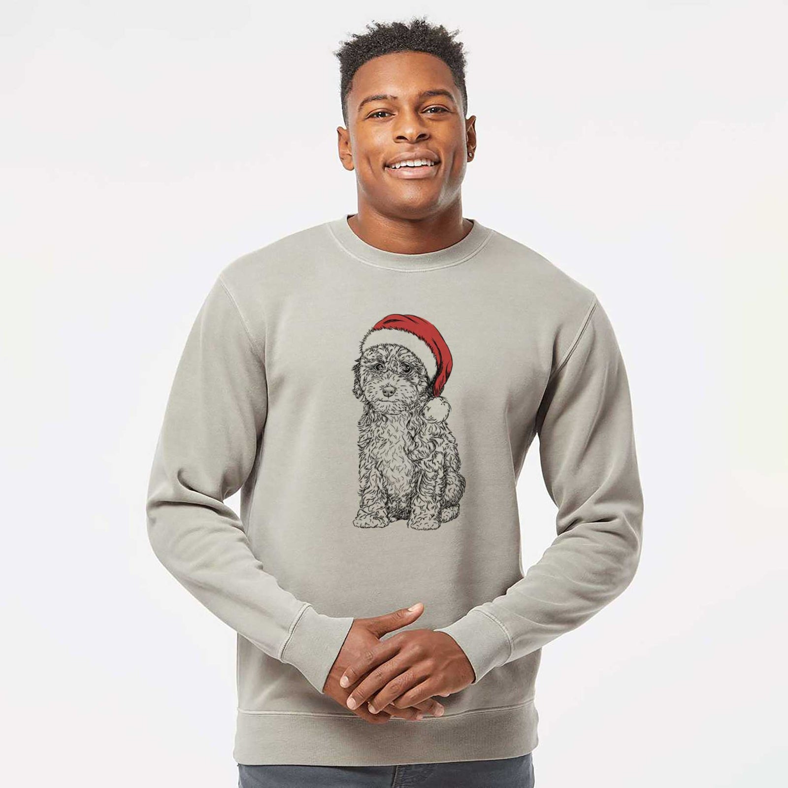 Hand-drawn sketch of Sweet Tea the Mini Doodle wearing a Santa hat on a Cement Unisex pigment dyed crew sweatshirt