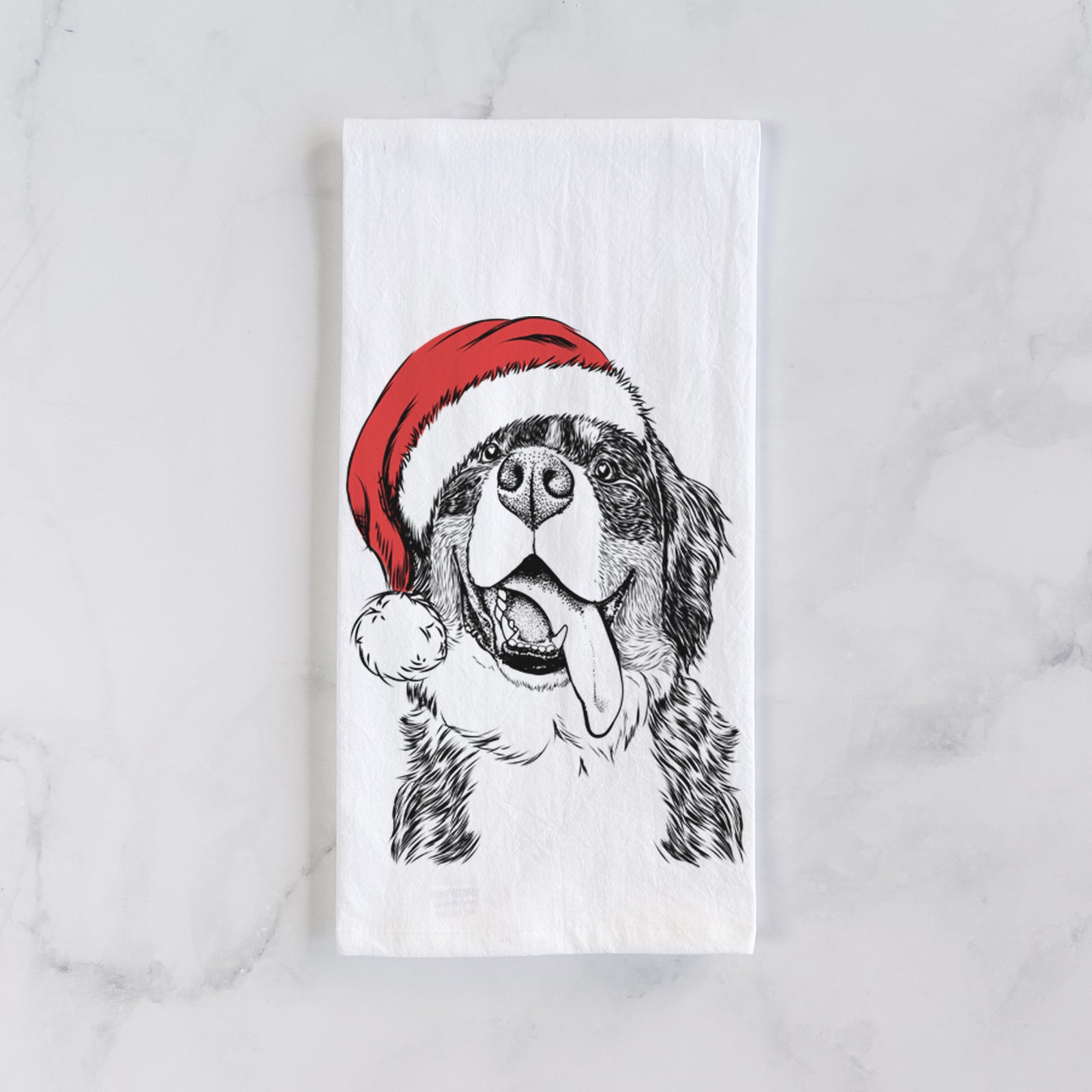 Hand-drawn sketch of Theo the Bernese Mountain Dog wearing a Santa hat on a tea towel