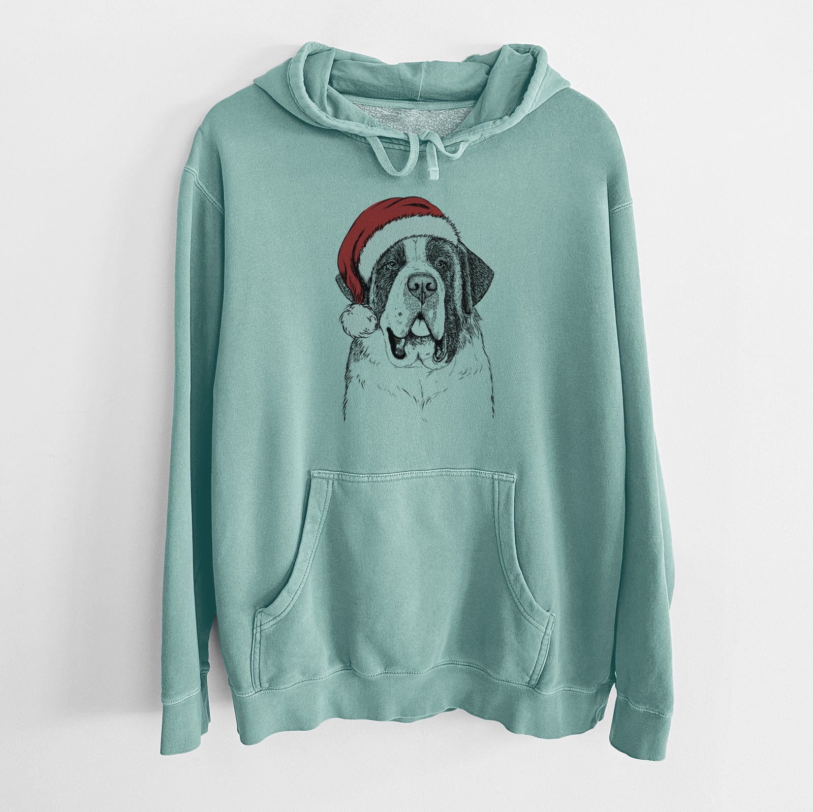 Hand-drawn sketch of Thor the Saint Bernard wearing a Santa hat on a Mint Unisex pigment dyed hoodie