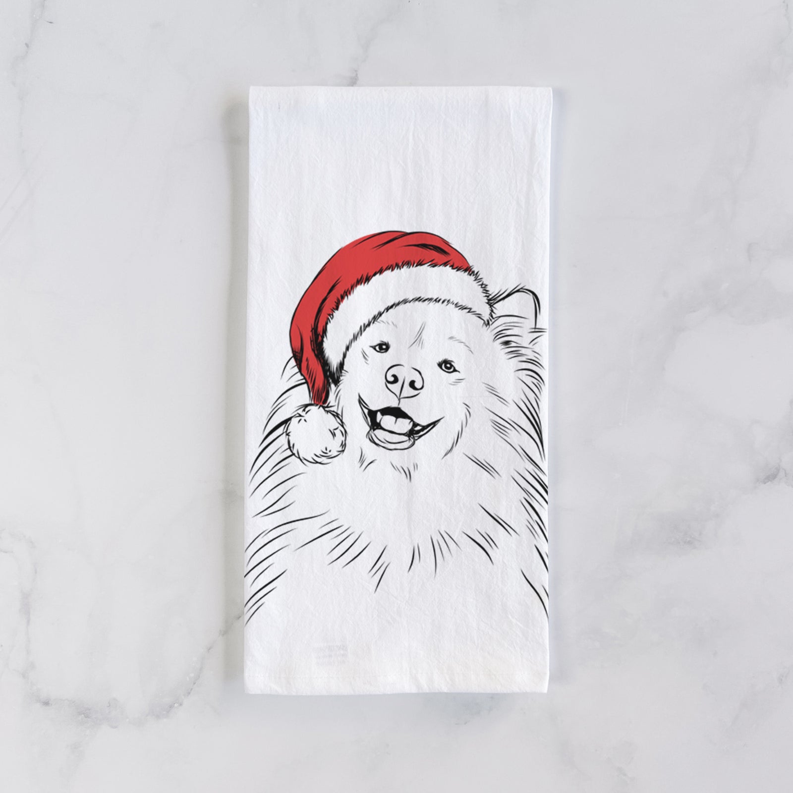 Hand-drawn sketch of Tillie the Samoyed wearing a Santa hat on a tea towel