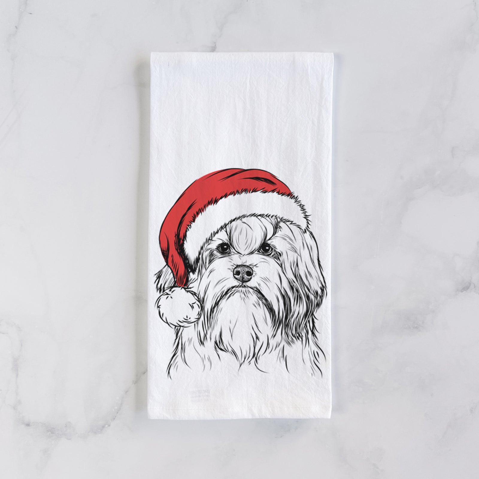 Hand-drawn sketch of Tootsie the Lowchen wearing a Santa hat on a tea towel