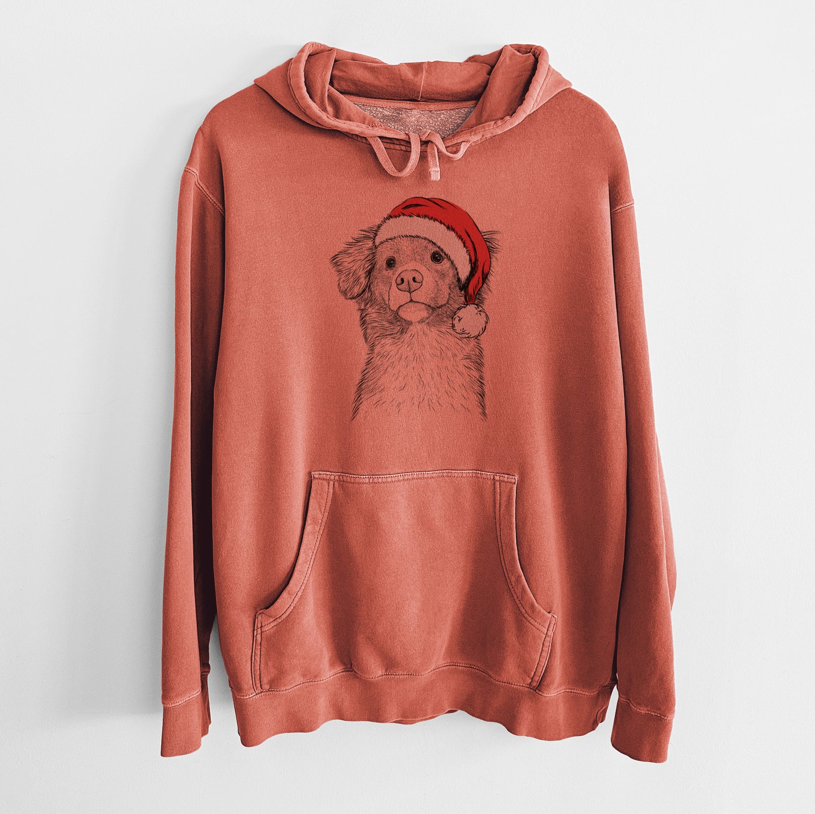 Hand-drawn sketch of Vixen the Nova Scotia Duck Tolling Retriever wearing a Santa hat on an Amber Unisex pigment dyed hoodie