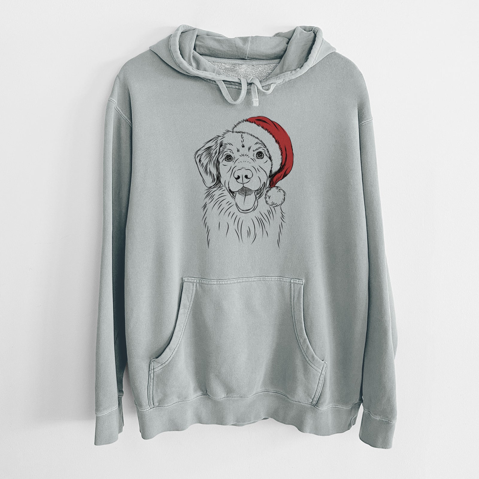 Hand-drawn sketch of Weston the Nova Scotia Duck Tolling Retriever wearing a Santa hat on a Sage Unisex pigment dyed hoodie