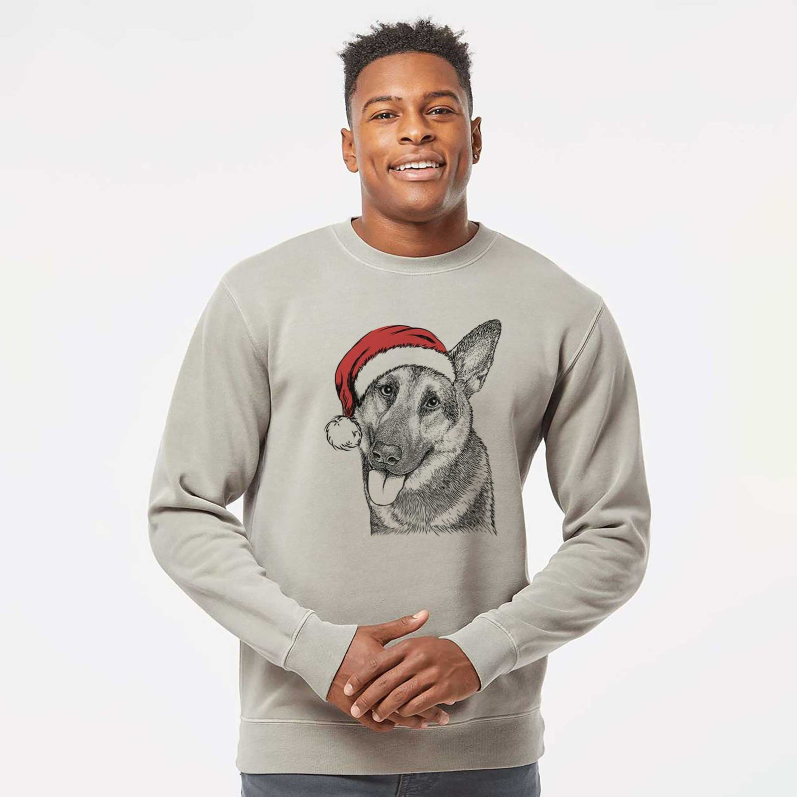 Hand-drawn sketch of Whitaker the German Shepherd wearing a Santa hat on a Cement Unisex pigment dyed crew sweatshirt