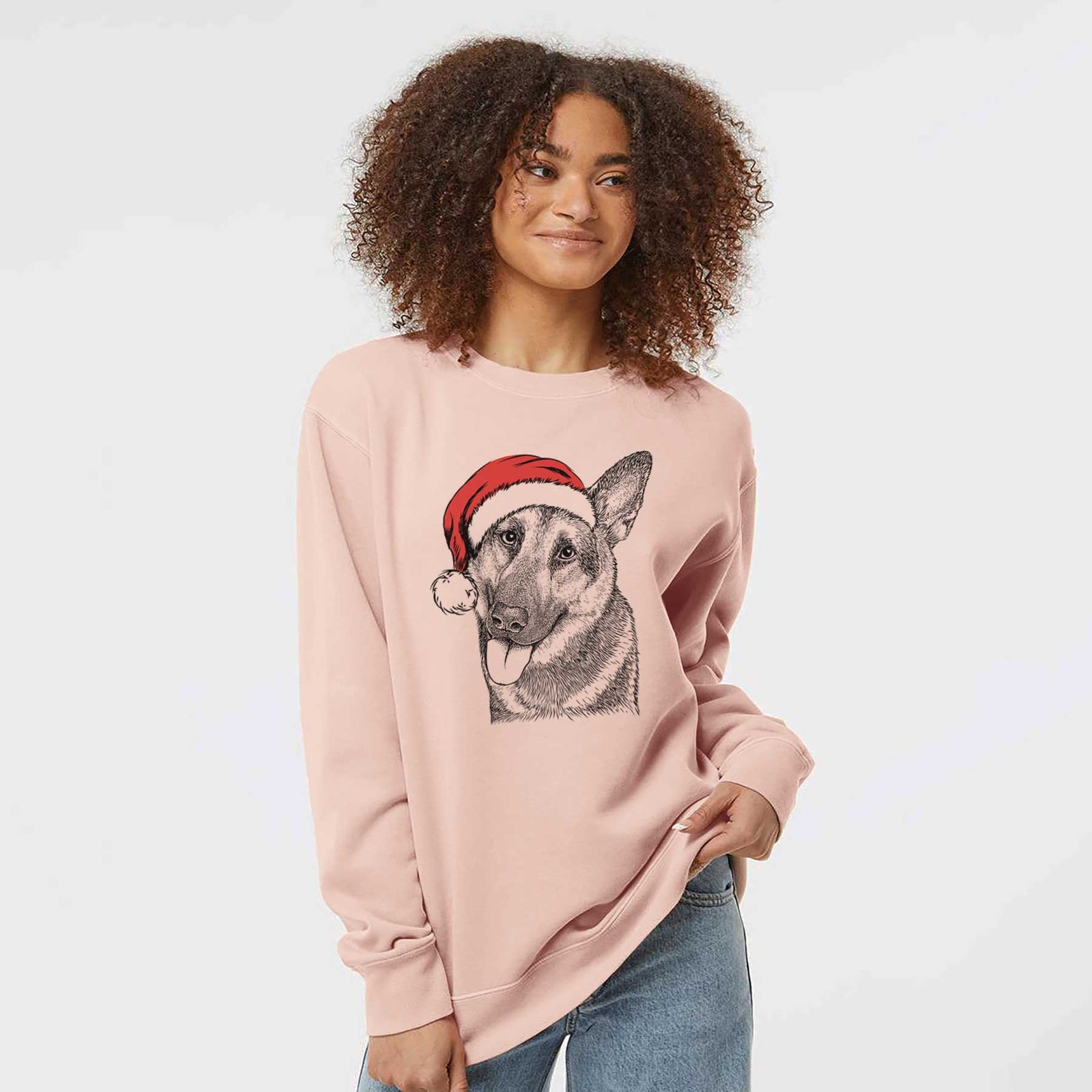Hand-drawn sketch of Whitaker the German Shepherd wearing a Santa hat on a Dusty Pink Unisex pigment dyed crew sweatshirt