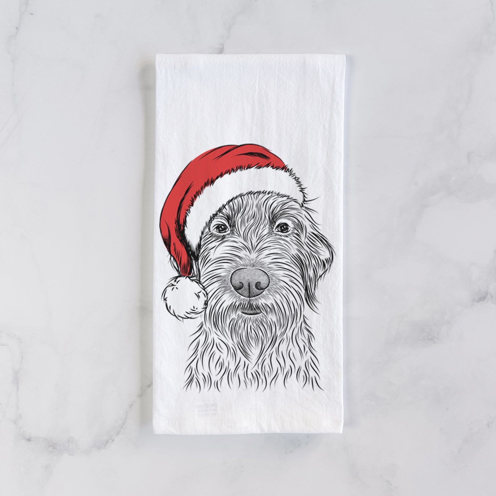 Hand-drawn sketch of Wilkins the Wirehaired Pointing Griffon wearing a Santa hat on a tea towel