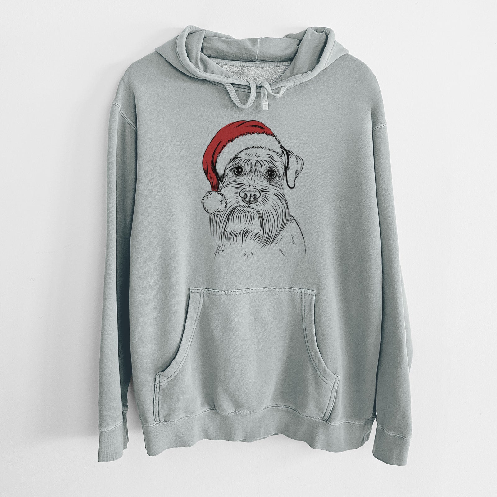 Hand-drawn sketch of Wrigley the Schnauzer wearing a Santa hat on a Sage Unisex pigment dyed hoodie