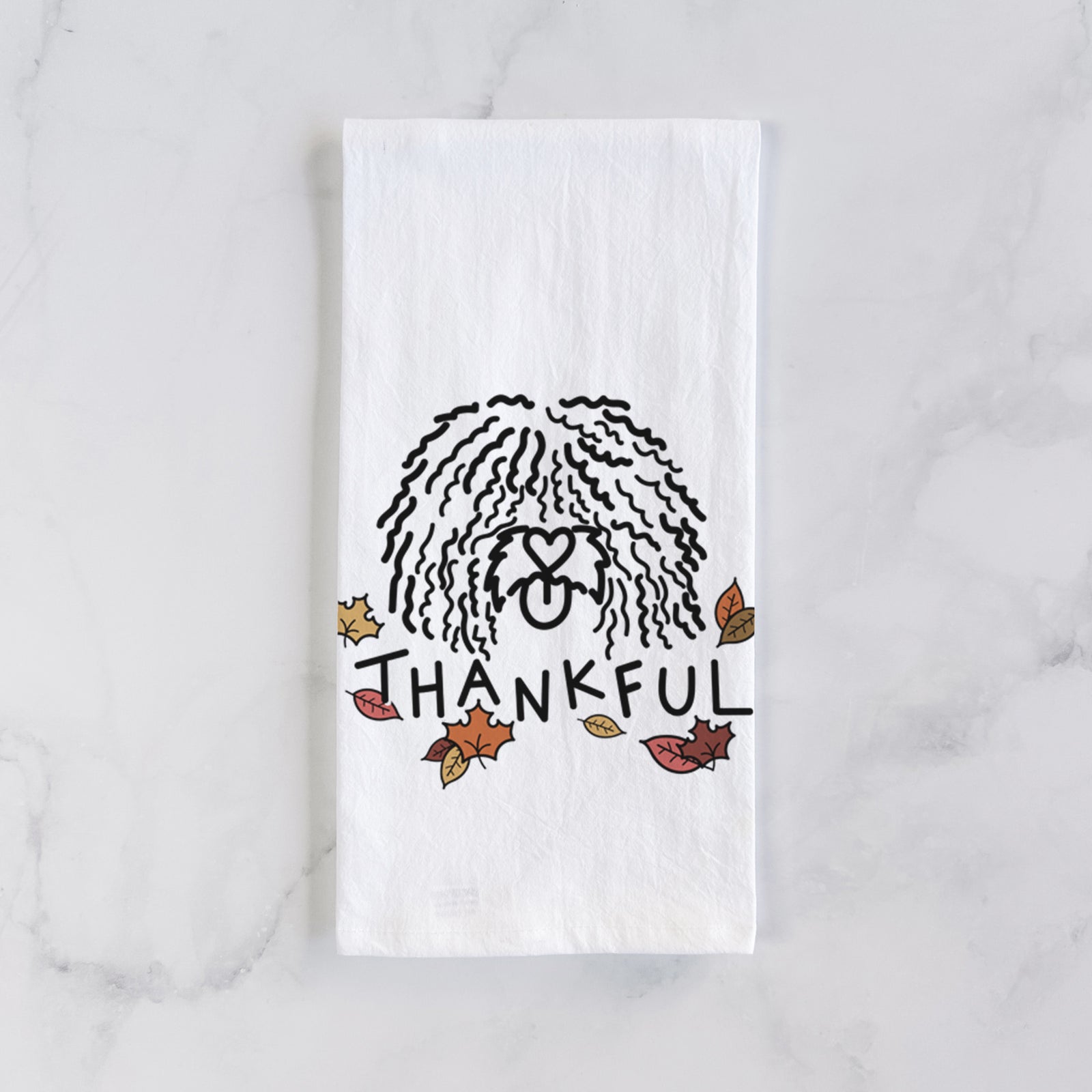 Minimalist line drawing of Alba the Spanish Water Dog with 'Thankful' lettering on a tea towel