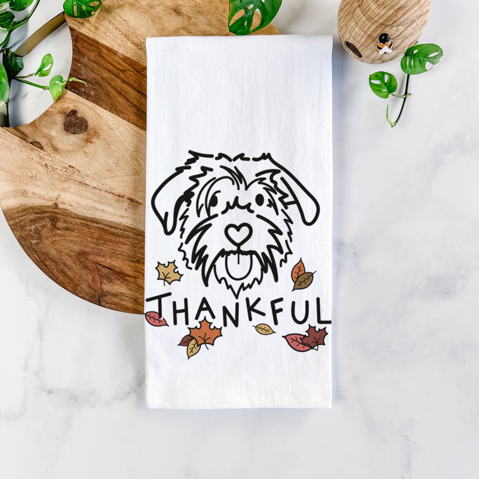 Minimalist line drawing of Amal the Scottish Terrier Border Collie Mix with 'Thankful' lettering on a tea towel