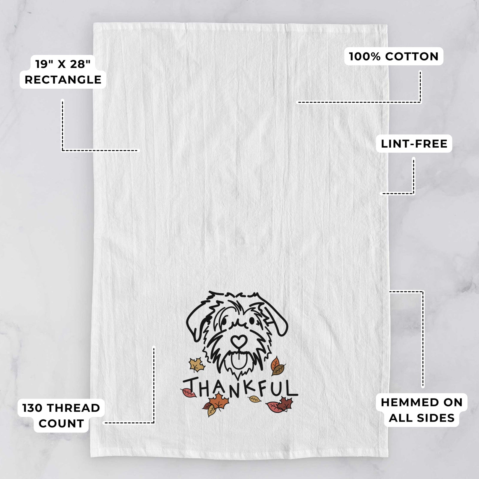Minimalist line drawing of Amal the Scottish Terrier Border Collie Mix with 'Thankful' lettering on a tea towel, with feature callouts: 19 x 28 inch rectangle, 100% cotton, lint-free, 120 thread count, hemmed on all sides