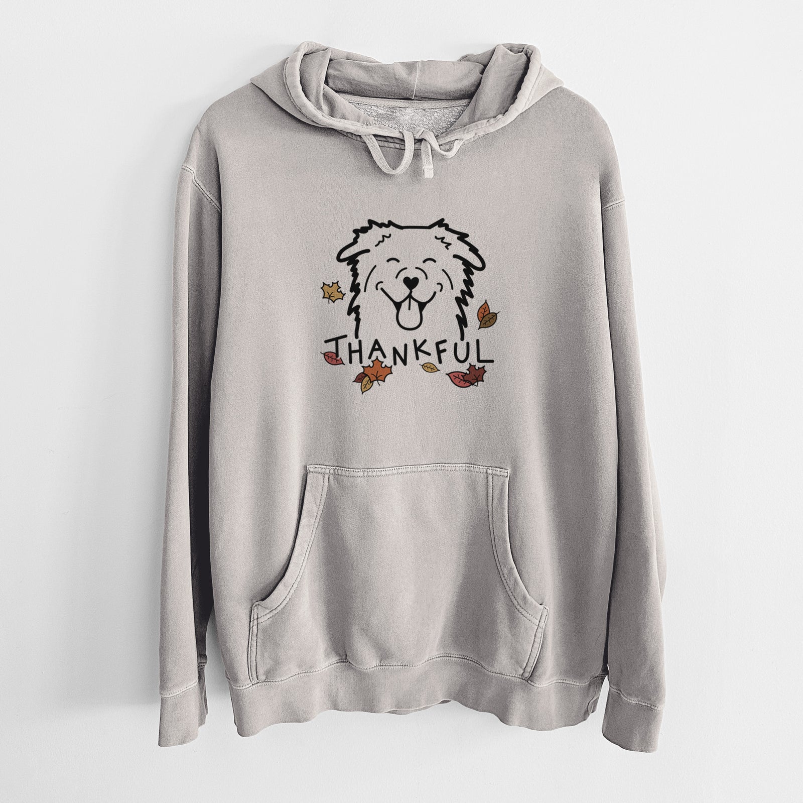 Minimalist line drawing of an Australian Shepherd with 'Thankful' lettering on a Cement Unisex pigment dyed hoodie