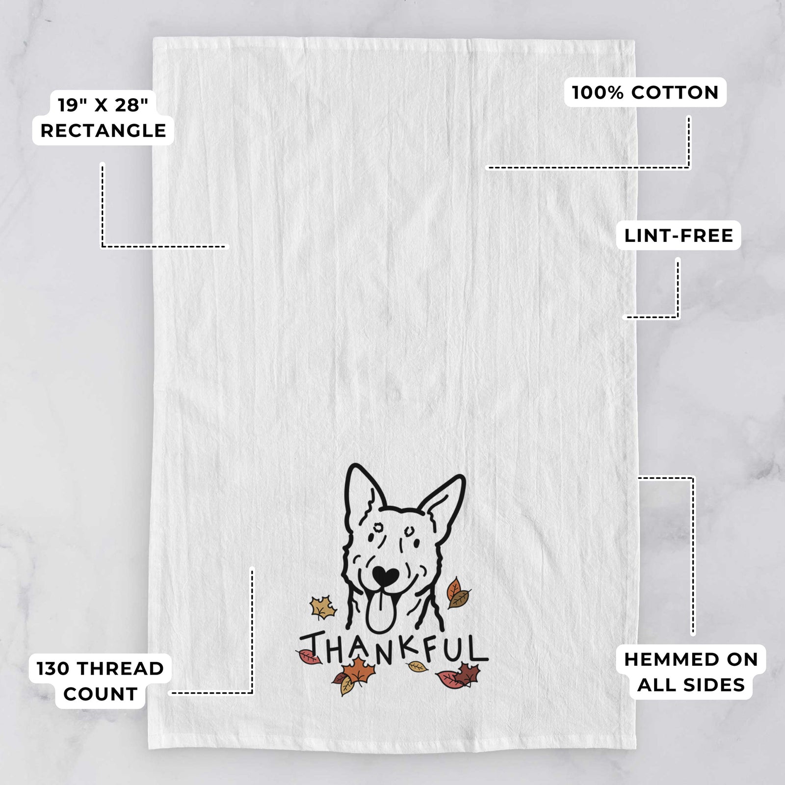 Minimalist line drawing of an Australian Cattle Dog with 'Thankful' lettering on a tea towel, with feature callouts: 19 x 28 inch rectangle, 100% cotton, lint-free, 120 thread count, hemmed on all sides