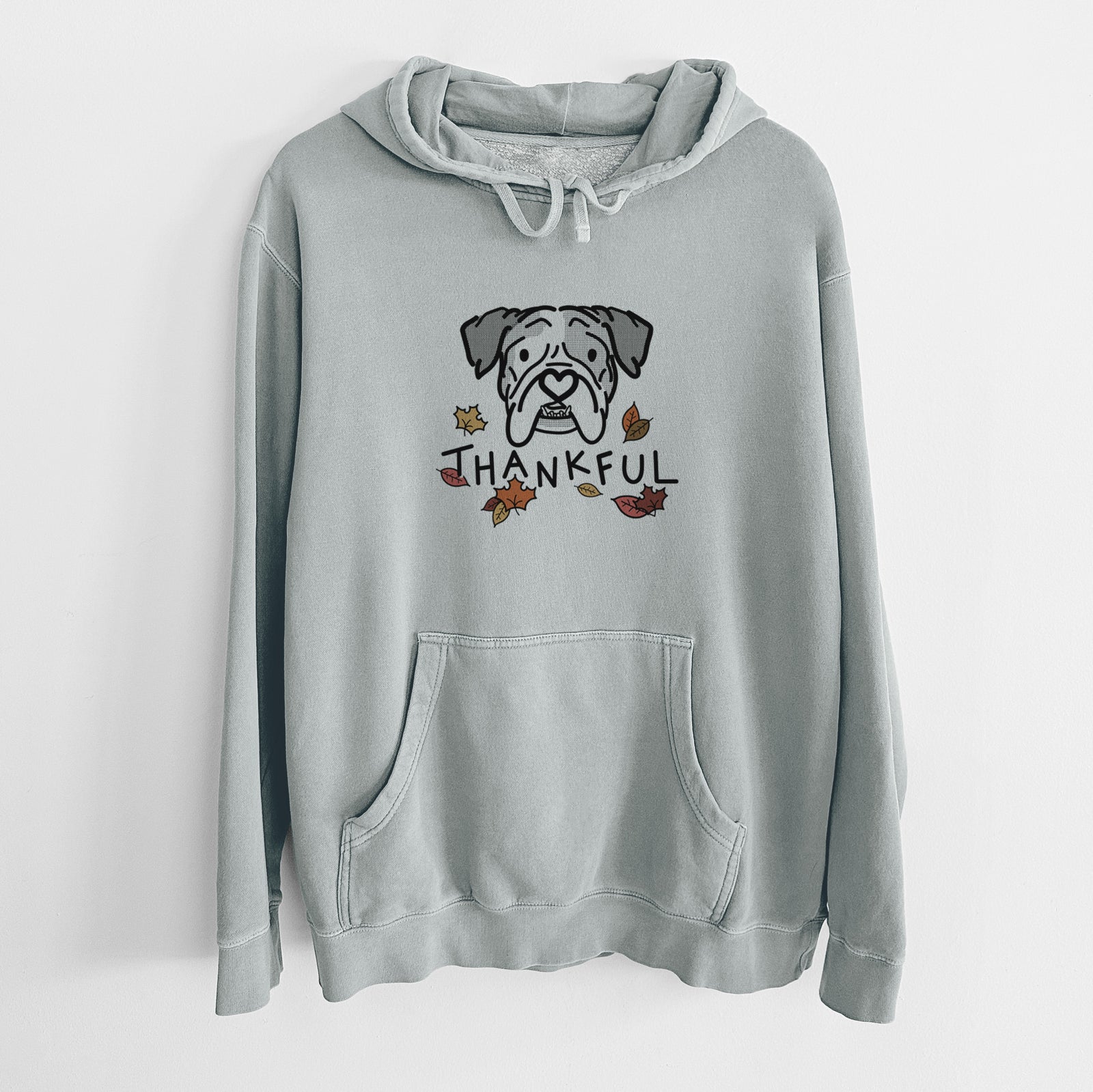 Minimalist line drawing of Bailey the English Bulldog with 'Thankful' lettering on a Sage Unisex pigment dyed hoodie