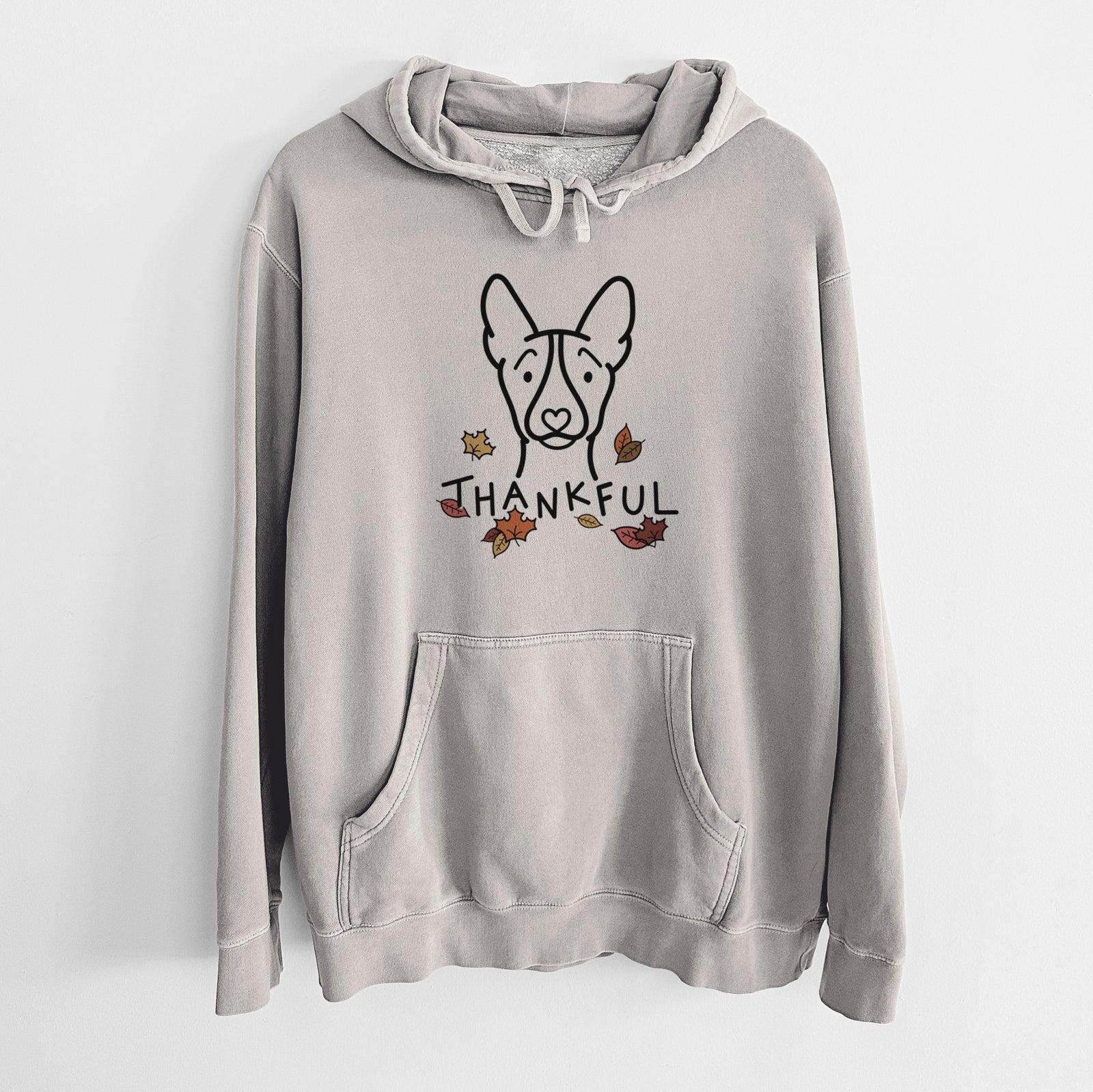 Minimalist line drawing of a Basenji with 'Thankful' lettering on a Cement Unisex pigment dyed hoodie
