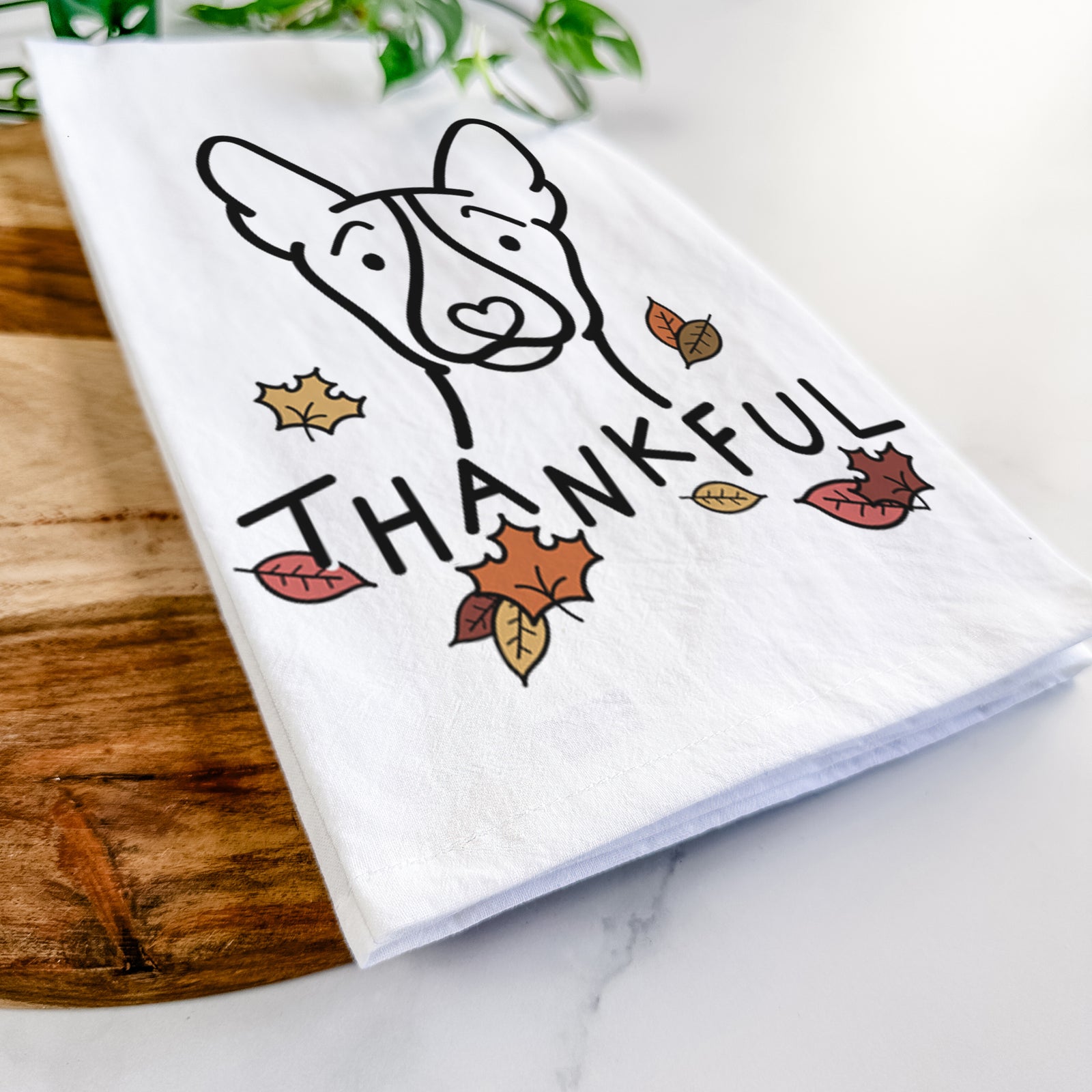 Minimalist line drawing of a Basenji with 'Thankful' lettering on a tea towel