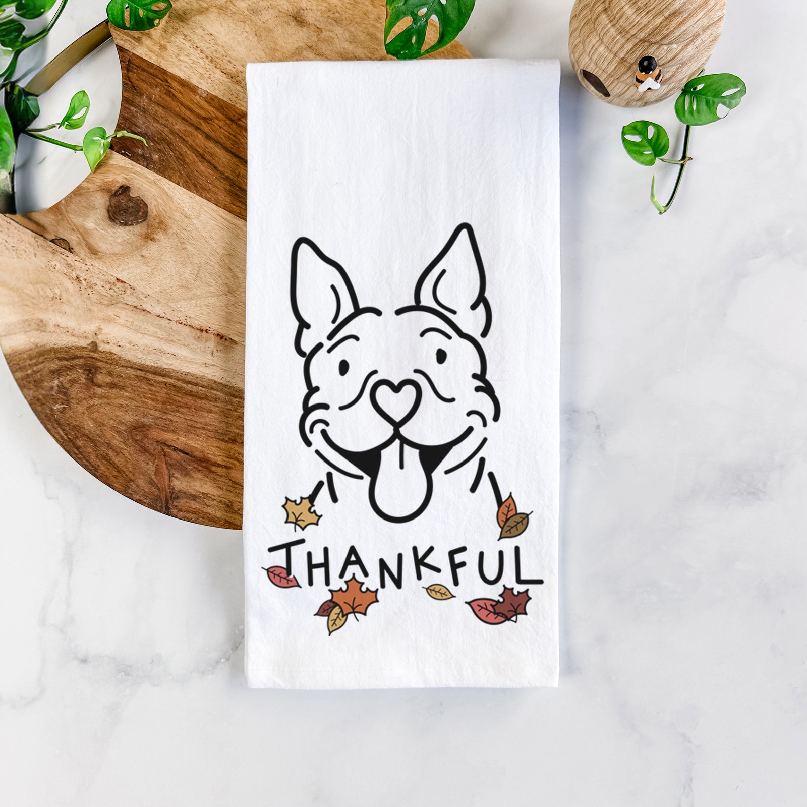 Minimalist line drawing of Basil the Pitbull with 'Thankful' lettering on a tea towel
