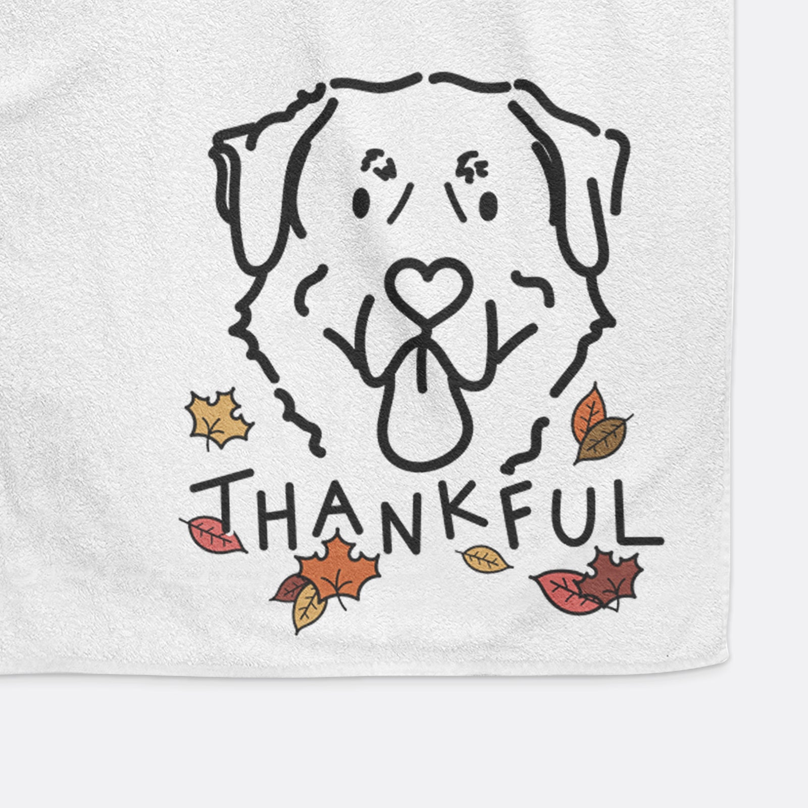 Minimalist line drawing of Batu the Anatolian Shepherd with 'Thankful' lettering on a decorative hand towel