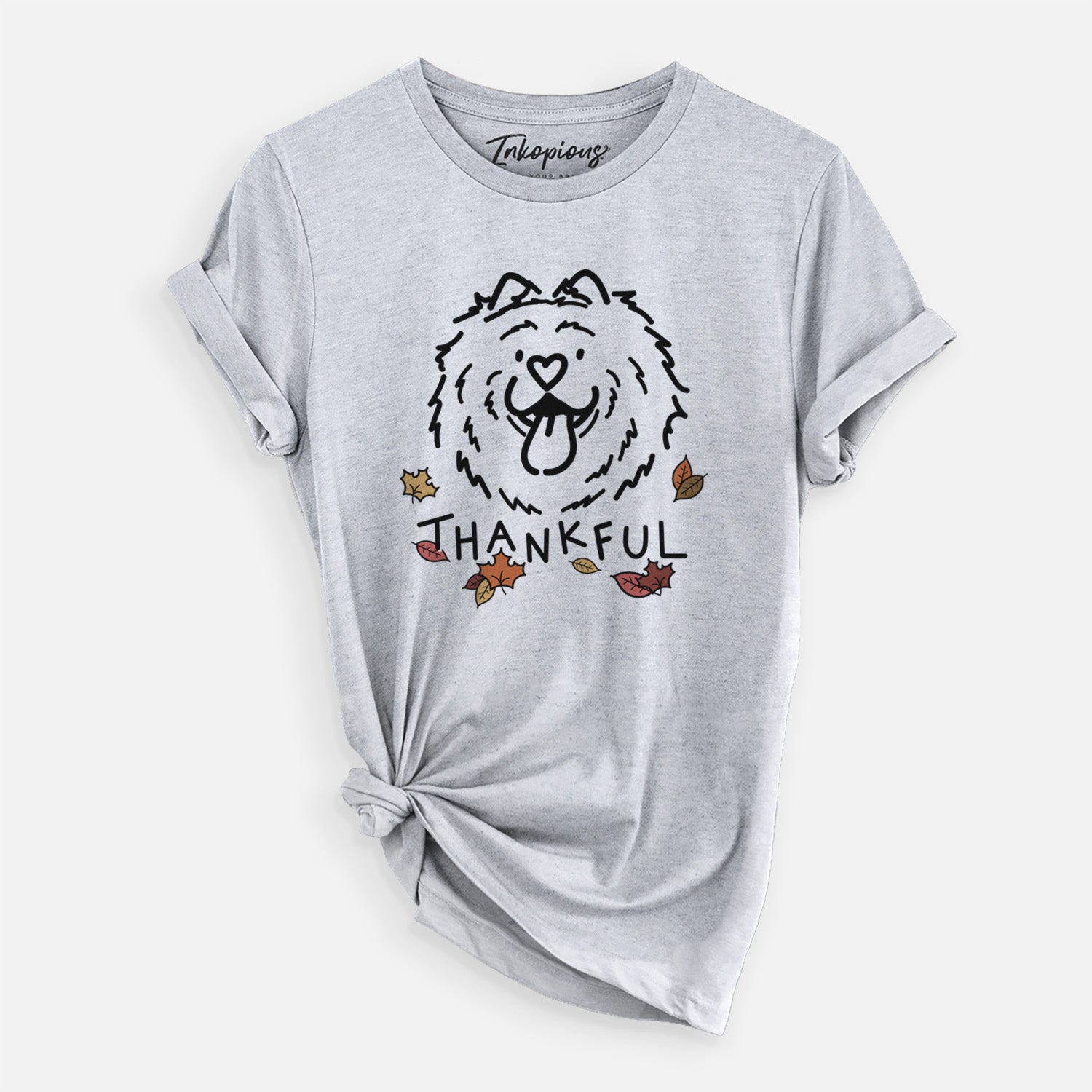 Minimalist line drawing of Bear the Chow Chow with 'Thankful' lettering on a Grey Unisex crewneck, worn by a woman