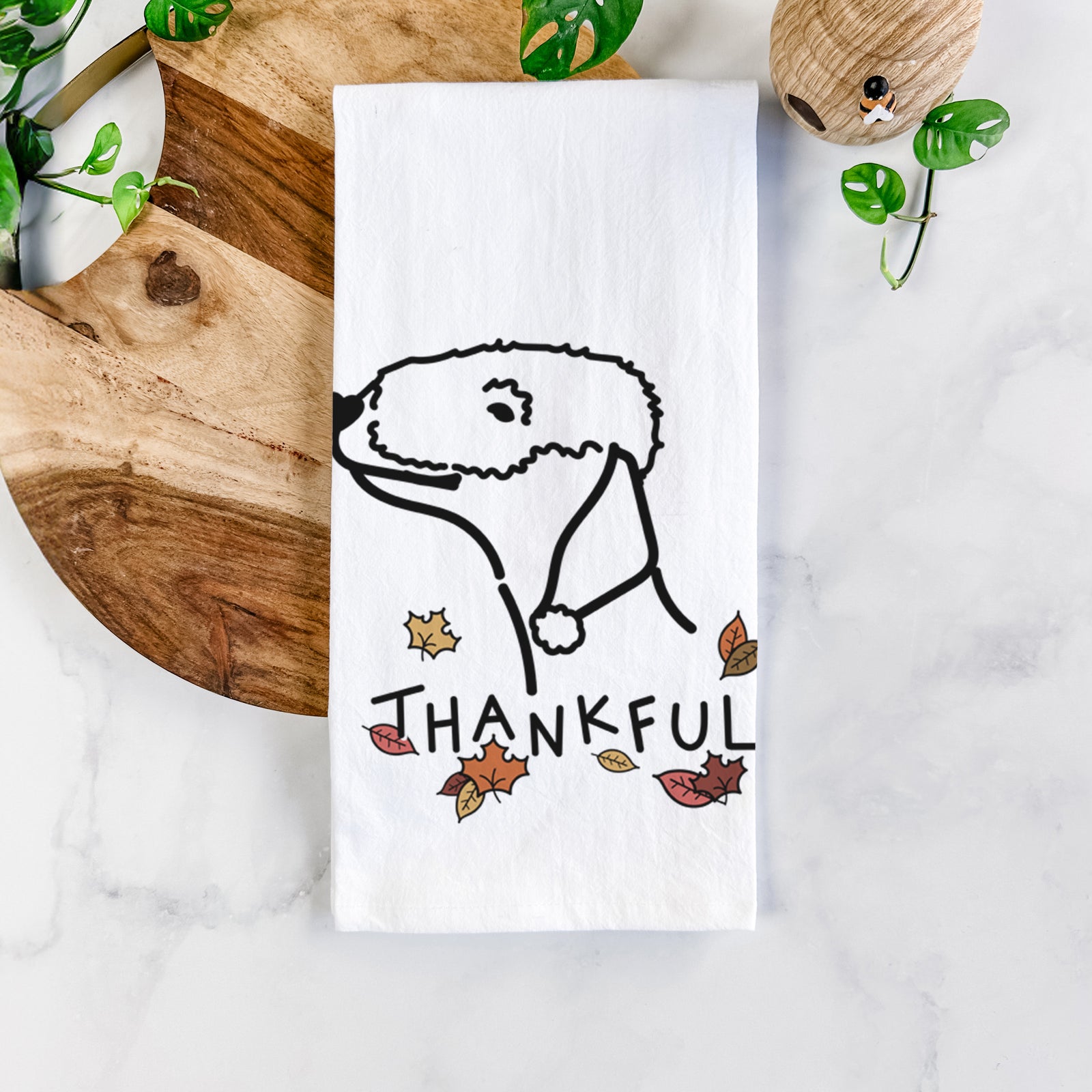 Minimalist line drawing of a Bedlington Terrier with 'Thankful' lettering on a tea towel