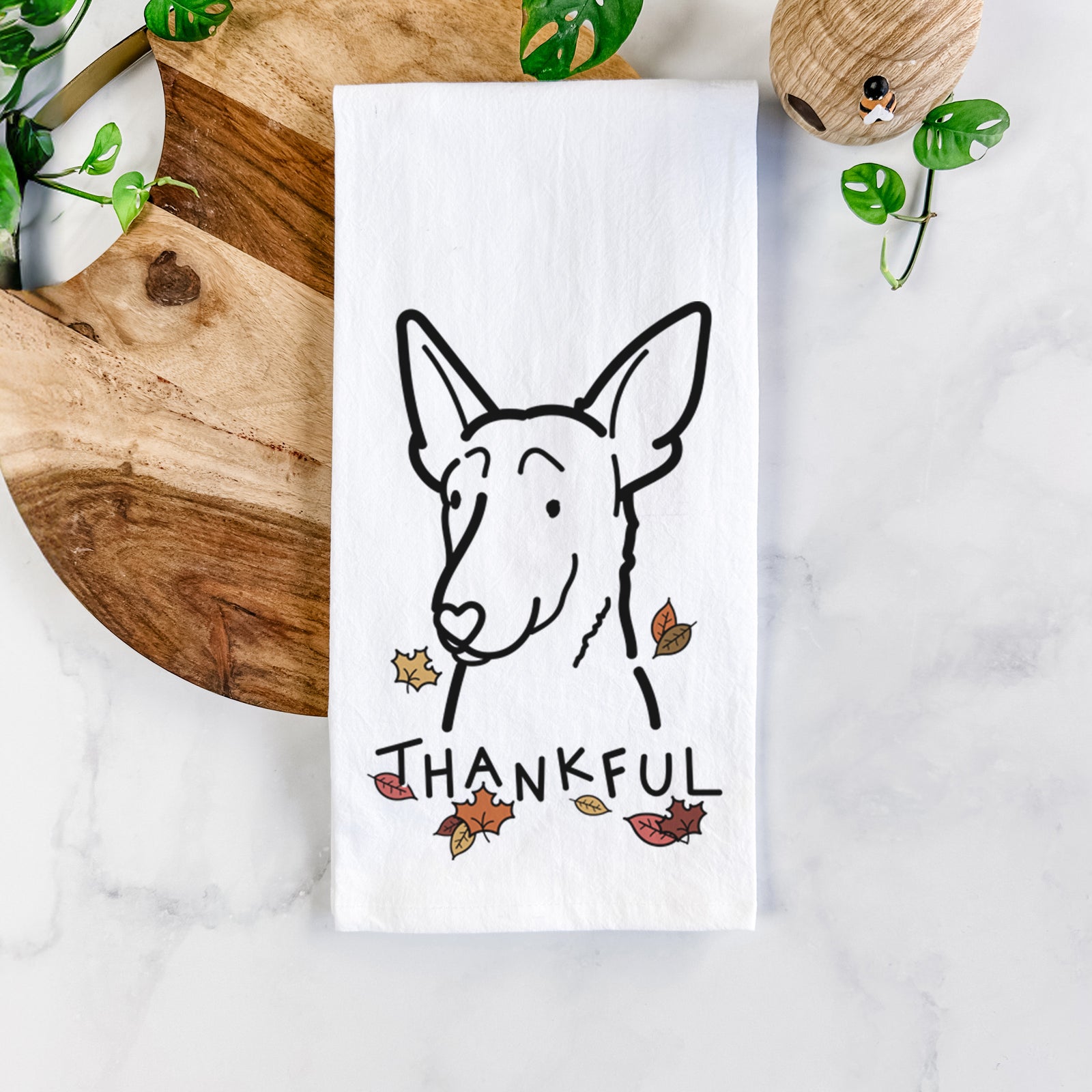 Minimalist line drawing of a Belgian Malinois with 'Thankful' lettering on a tea towel