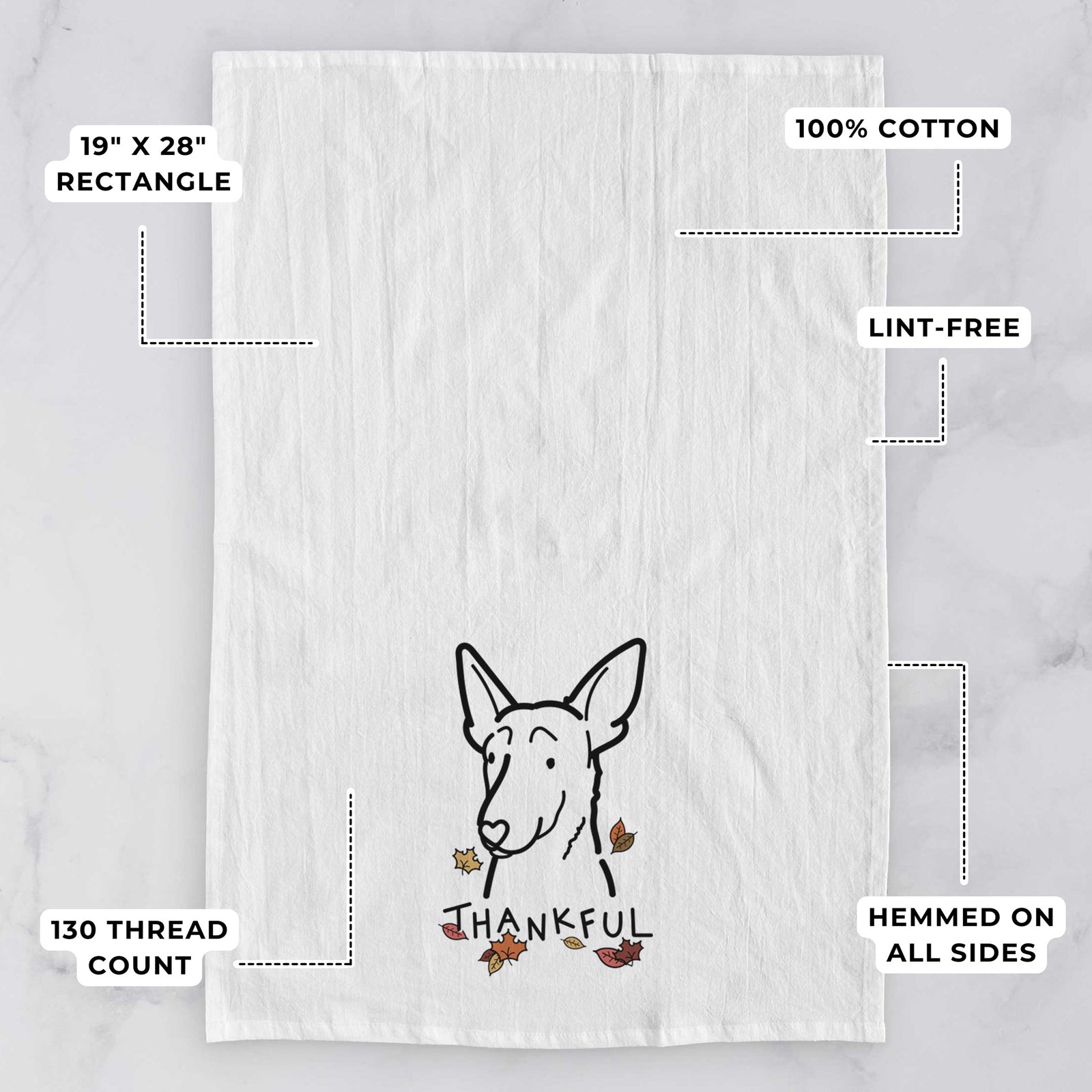 Minimalist line drawing of a Belgian Malinois with 'Thankful' lettering on a tea towel, with feature callouts: 19 x 28 inch rectangle, 100% cotton, lint-free, 120 thread count, hemmed on all sides