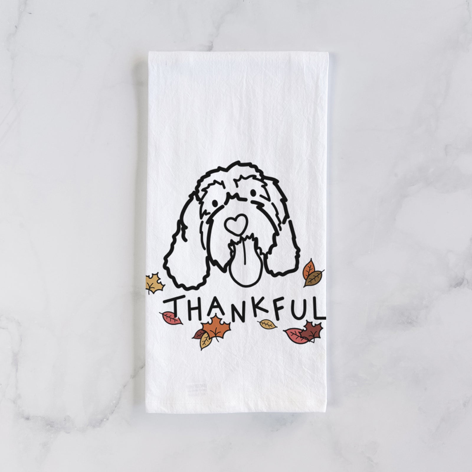 Minimalist line drawing of Bo the Portguese Water Dog with 'Thankful' lettering on a tea towel