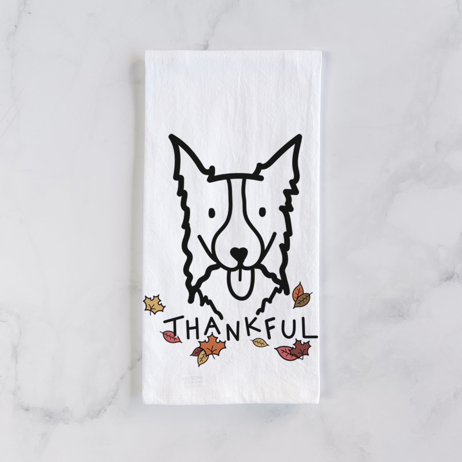 Minimalist line drawing of a Border Collie with 'Thankful' lettering on a tea towel