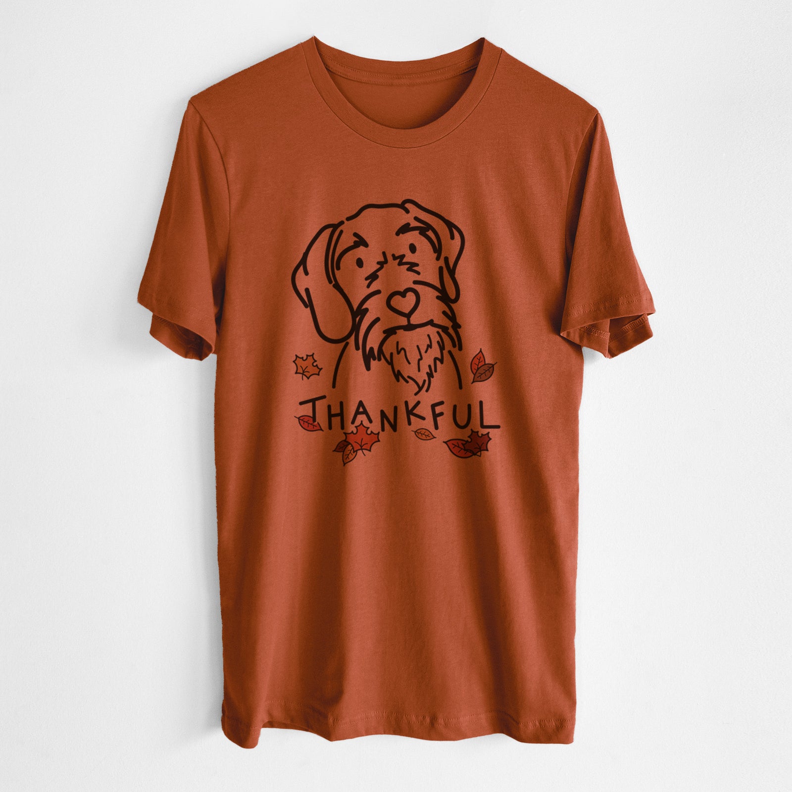 Minimalist line drawing of Buck the German Wirehaired Pointer with 'Thankful' lettering on an Autumn Unisex crewneck, worn by a man