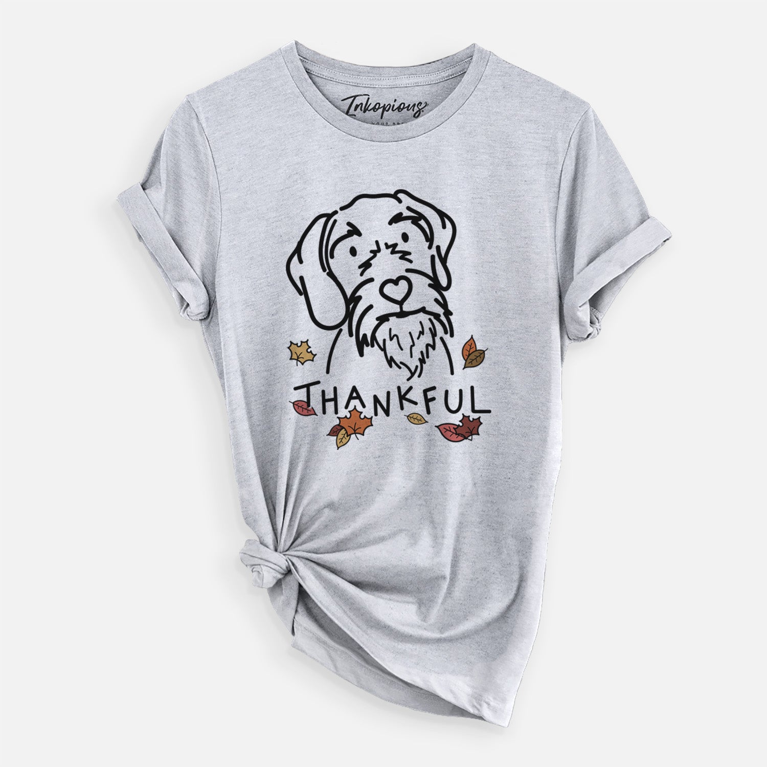 Minimalist line drawing of Buck the German Wirehaired Pointer with 'Thankful' lettering on a Grey Unisex crewneck, worn by a woman